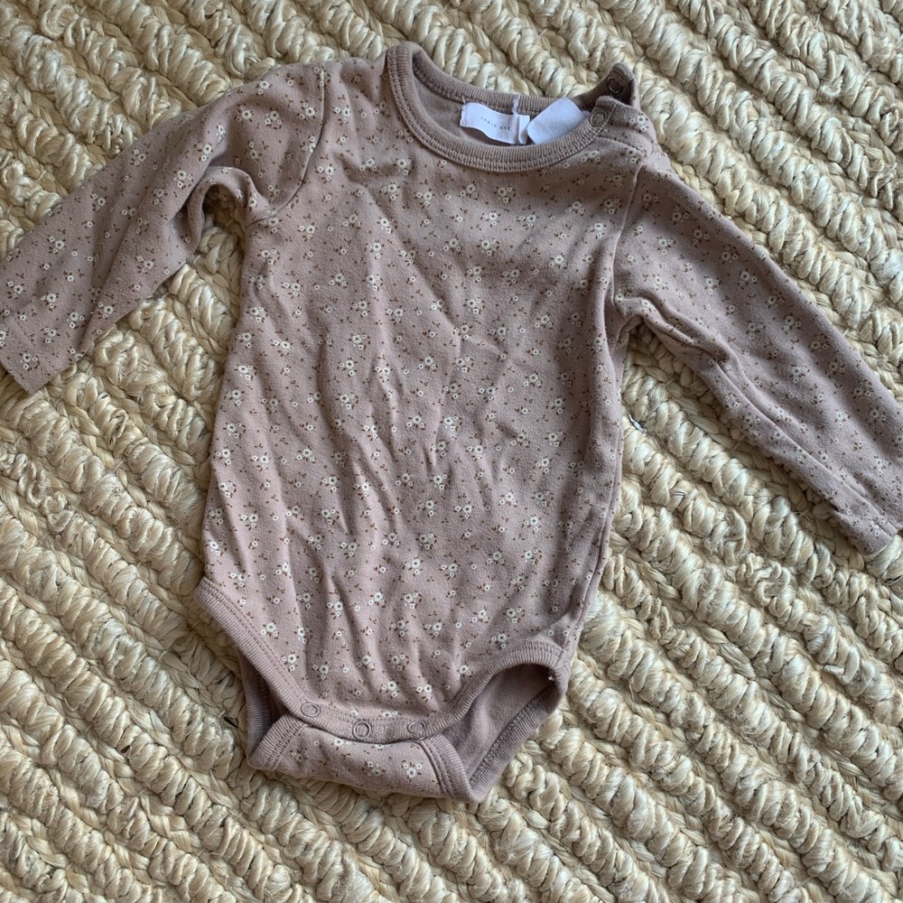 Jamie Kay onesie